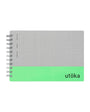 Notebook with grid pattern on gray cover and green bottom section, featuring the brand 'utöka'.