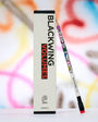 Blackwing pencil and packaging with colorful abstract background