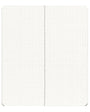 Notebook with grid and dot grid pages on a white background