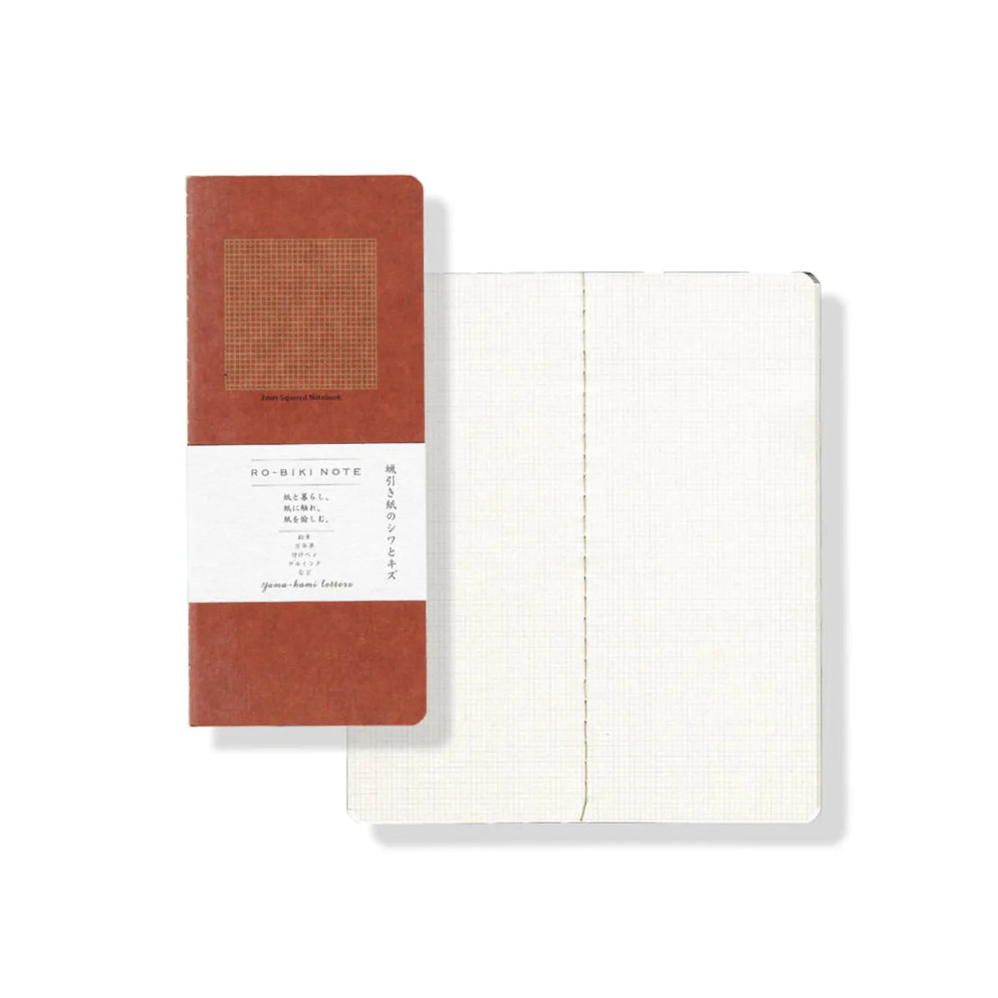 Notebook with red cover and white pages on a white background