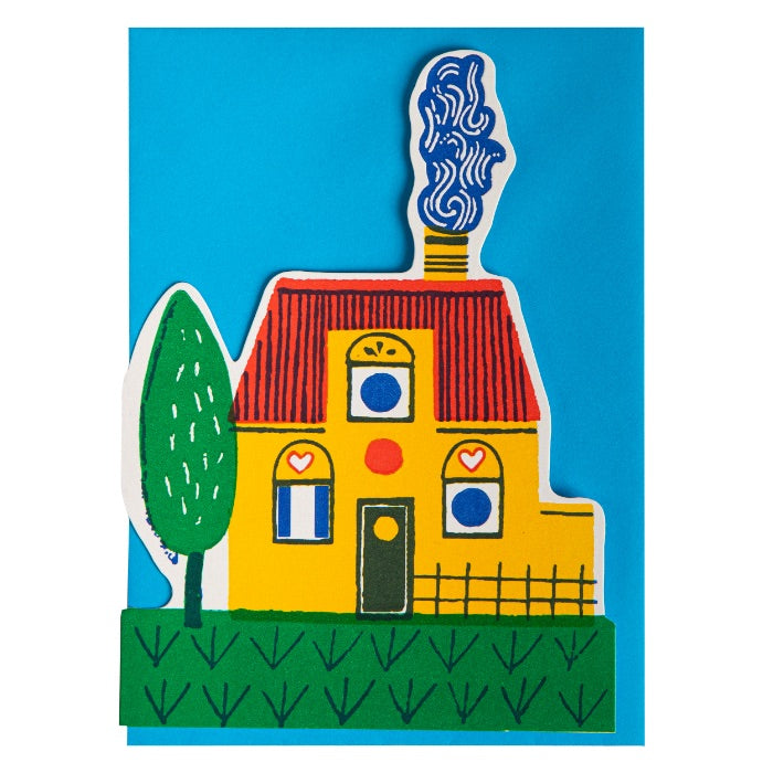 Colorful house illustration on a blue background