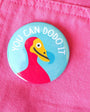 Button badge with a dodo bird design and text 'YOU CAN DODO IT' on a pink background