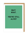 You're Still Alive? Greeting Card in black writing and on a green and white card.