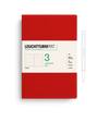 Red notebook with white cover featuring Leuchtturm1917 branding on a white background