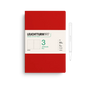Red notebook with white cover featuring Leuchtturm1917 branding on a white background