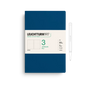 Leuchtturm1917 notebook with a pen on a white background