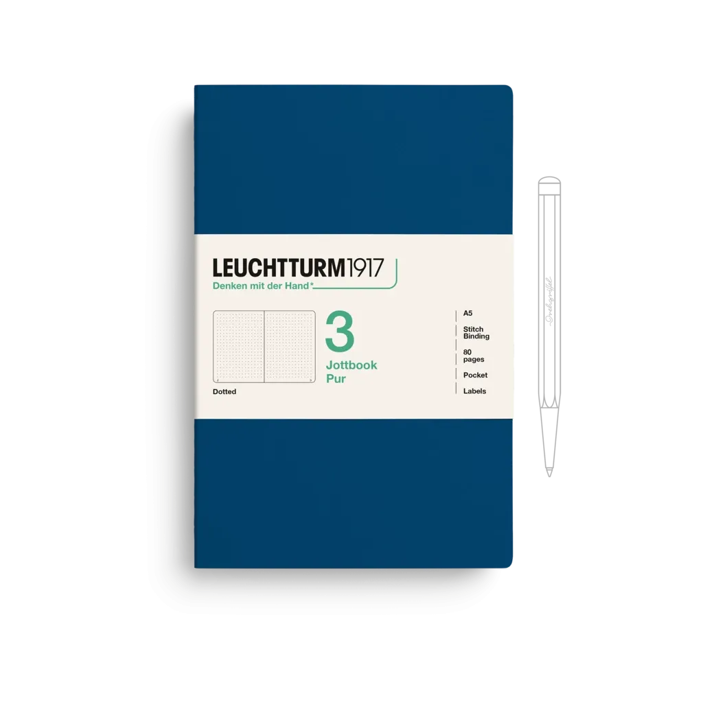 Leuchtturm1917 notebook with a pen on a white background
