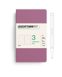 Leuchtturm1917 notebook with a pen on a white background