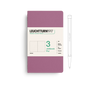 Leuchtturm1917 notebook with a pen on a white background