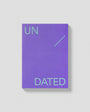 Purple notebook with 'UNDATED' text on a light gray background